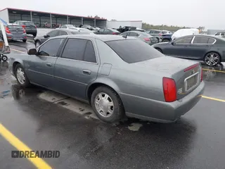 2005 Cadillac DeVille z VIN 1G6KD54Y15U225816, wystawiony jako IAAI lot #41846992 z przebiegiem 134 707 mil mil oraz . Historia ofert i sprzedaży dostępna na DreamBid. Obrazek 3.
