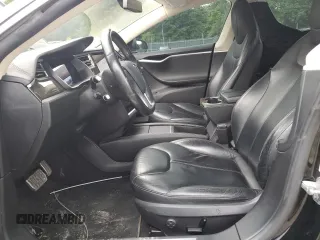 2014 Tesla Model S 60 with VIN 5YJSA1H11EFP65266, listed as a Copart auction lot 60934805 with 93,546 mi miles and Salvage title. Bid and sale history available at DreamBid. Image 7.