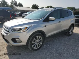 2018 Ford Escape Titanium with VIN 1FMCU0J95JUD44086, listed as a Copart auction lot 58978865 with 90,874 mi miles and Salvage title. Bid and sale history available at DreamBid. Image 1.