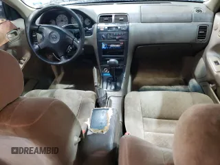 1998 Nissan Maxima GXE with VIN JN1CA21D3WT532196, listed as a Copart auction lot 43210915 with 277,946 mi miles and Salvage title. Bid and sale history available at DreamBid. Image 8.