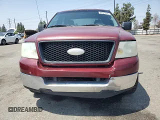 2005 Ford F-150 XLT with VIN 1FTPW125X5KF09293, listed as a Copart auction lot 60921515 with 154,521 mi miles and Salvage title. Bid and sale history available at DreamBid. Image 5.