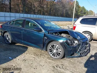2018 Buick Regal Sportback Essence with VIN W04GP6SX7J1121153, listed as a IAAI auction lot 40979617 with 88,370 mi miles. Bid and sale history available at carsss.com. Image 1.