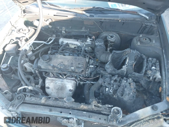 1999 Mitsubishi Mirage DE z VIN JA3AY26A0XU017889, wystawiony jako IAAI lot #40457172 z przebiegiem Nie podano mil oraz . Historia ofert i sprzedaży dostępna na DreamBid. Obrazek 11.