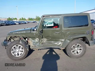 2015 Jeep Wrangler Rubicon Hard Rock with VIN 1C4BJWCGXFL771669, listed as a IAAI auction lot 42057423 with 36,996 mi miles and . Bid and sale history available at DreamBid. Image 15.