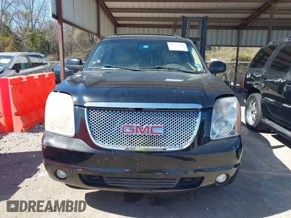 2012 GMC Yukon XL SLT with VIN 1GKS2KE77CR178173, listed as a IAAI auction lot 41778706 with 175,654 mi miles. Bid and sale history available at carsss.com. Image 12.