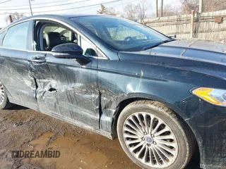 2014 Ford Fusion Titanium with VIN 3FA6P0K90ER336116, listed as a IAAI auction lot 41559792 with 132,852 mi miles. Bid and sale history available at carsss.com. Image 6.