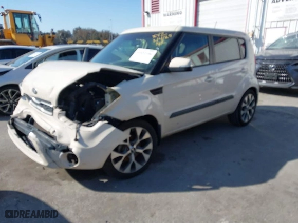 2013 Kia Soul + with VIN KNDJT2A6XD7760122, listed as a IAAI auction lot 41652106 with 116,237 mi miles. Bid and sale history available at carsss.com. Image 2.