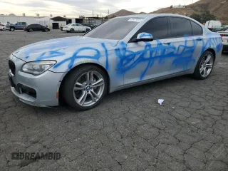 2015 BMW 7 Series 740i with VIN WBAYA6C59FD826757, listed as a Copart auction lot 41475055 with 140,665 mi miles and Salvage Title. Bid and sale history available at carsss.com. Image 1.