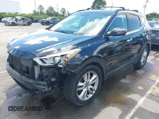 2013 Hyundai Santa Fe Sport z VIN 5XYZUDLA1DG050879, wystawiony jako IAAI lot #42236937 z przebiegiem 124 779 mil mil oraz . Historia ofert i sprzedaży dostępna na DreamBid. Obrazek 2.