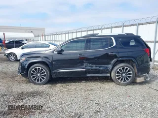 2020 GMC Acadia Denali with VIN 1GKKNXLS0LZ114519, listed as a IAAI auction lot 41650447 with 91,983 mi miles. Bid and sale history available at carsss.com. Image 14.