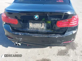 2014 BMW 3 Series 328i z VIN WBA3A5G54ENP31921, wystawiony jako IAAI lot #42374240 z przebiegiem 148 671 mil mil oraz . Historia ofert i sprzedaży dostępna na DreamBid. Obrazek 6.