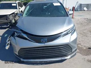 2021 Toyota Sienna LE with VIN 5TDBRKEC2MS021058, listed as a IAAI auction lot 41863947 with 73,608 mi miles. Bid and sale history available at carsss.com. Image 11.