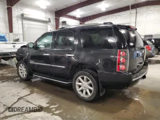 2013 GMC Yukon Denali with VIN 1GKS2EEF0DR283857, listed as a Copart auction lot 46505705 with 148,428 mi miles and Salvage Title. Bid and sale history available at carsss.com. Image 2.