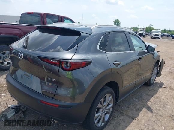 2025 Mazda CX-30 S Preferred with VIN 3MVDMBCM2SM776872, listed as a IAAI auction lot 42582130 with 9,541 mi miles and . Bid and sale history available at DreamBid. Image 4.