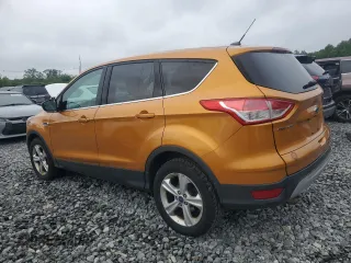 2016 Ford Escape SE с VIN 1FMCU9GXXGUA57569, выставлен на аукционе Copart как лот 61057195 с пробегом 143 025 миль миль и Чистый • Clean title. История ставок и продаж доступна на DreamBid. Изображение 2.