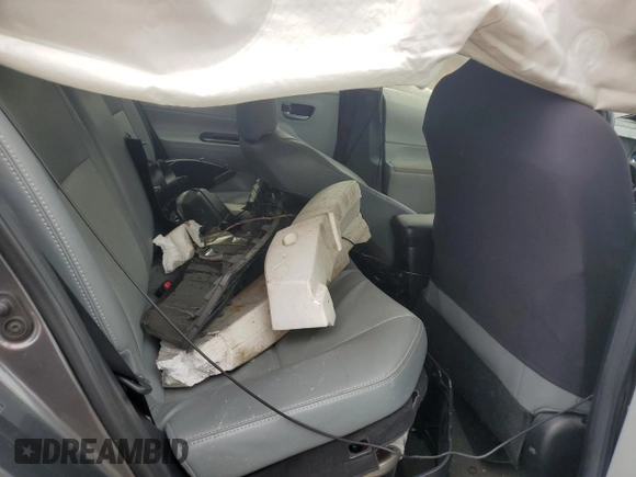 2014 Toyota Prius One z VIN JTDKDTB33E1066355, wystawiony jako Copart lot #58524285 z przebiegiem Nie podano mil oraz Szkoda całkowita • Salvage title. Historia ofert i sprzedaży dostępna na DreamBid. Obrazek 10.