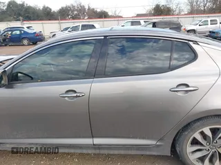 2015 Kia Optima SX Turbo with VIN 5XXGR4A6XFG395441, listed as a IAAI auction lot 41460842 with 140,958 mi miles. Bid and sale history available at carsss.com. Image 14.