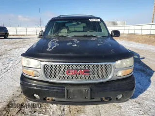 2001 GMC Yukon Denali с VIN 1GKEK63U01J253479, выставлен на аукционе Copart как лот 83272054 с пробегом 217 364 миль миль и Чистый • Clean title. История ставок и продаж доступна на DreamBid. Изображение 5.