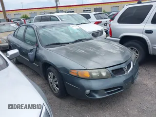 2005 Pontiac Bonneville SE z VIN 1G2HX52K25U205401, wystawiony jako IAAI lot #36831185 z przebiegiem 197 357 mil mil oraz . Historia ofert i sprzedaży dostępna na DreamBid. Obrazek 1.