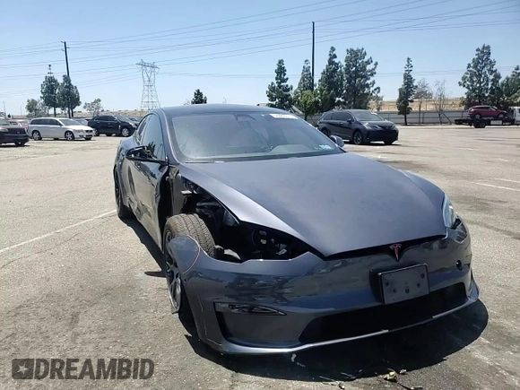 2022 Tesla Model S z VIN 5YJSA1E53NF491494, wystawiony jako Copart lot #56483015 z przebiegiem 31 507 mil mil oraz Szkoda całkowita • Salvage title. Historia ofert i sprzedaży dostępna na DreamBid. Obrazek 14.