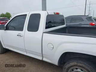 2012 Chevrolet Colorado Work Truck z VIN 1GCESBF90C8125314, wystawiony jako IAAI lot #42125523 z przebiegiem Nie podano mil oraz . Historia ofert i sprzedaży dostępna na DreamBid. Obrazek 14.