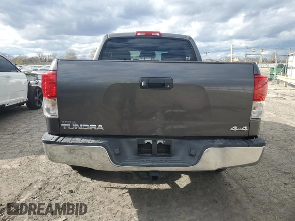 2013 Toyota Tundra z VIN 5TFDY5F14DX319647, wystawiony jako Copart lot #53100025 z przebiegiem 163 142 mil mil oraz Szkoda całkowita • Salvage title. Historia ofert i sprzedaży dostępna na DreamBid. Obrazek 6.