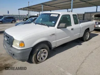 2009 Ford Ranger XL with VIN 1FTYR14D79PA19158, listed as a Copart auction lot 60335705 with 77,128 mi miles and Salvage title. Bid and sale history available at DreamBid. Image 1.