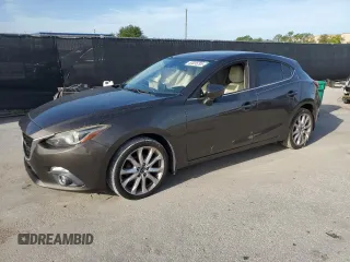 2014 Mazda 3 S Grand Touring with VIN JM1BM1M35E1211686, listed as a Copart auction lot 63035295 with 234,561 mi miles and Clean title. Bid and sale history available at DreamBid. Image 1.