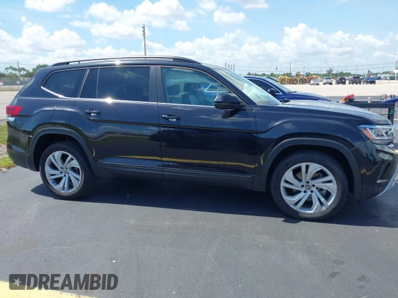 2021 Volkswagen Atlas SE with VIN 1V2WR2CA1MC607768, listed as a IAAI auction lot 42518885 with 49,286 mi miles and . Bid and sale history available at DreamBid. Image 14.