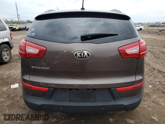 2013 Kia Sportage LX с VIN KNDPB3A28D7512869, выставлен на аукционе Copart как лот 87435794 с пробегом 92 717 миль миль и Чистый • Clean title. История ставок и продаж доступна на DreamBid. Изображение 6.