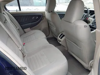 2011 Ford Taurus SE with VIN 1FAHP2DW7BG128857, listed as a IAAI auction lot 41705643 with 163,589 mi miles. Bid and sale history available at carsss.com. Image 8.