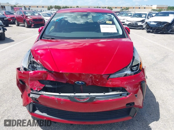 2021 Toyota Prius L Eco with VIN JTDKAMFU4M3145215, listed as a IAAI auction lot 42281566 with 74,220 mi miles and . Bid and sale history available at DreamBid. Image 6.