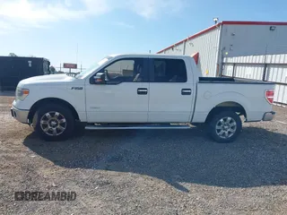2014 Ford F-150 XL with VIN 1FTFW1CTXEFC12946, listed as a IAAI auction lot 41814929 with 230,328 mi miles. Bid and sale history available at carsss.com. Image 15.