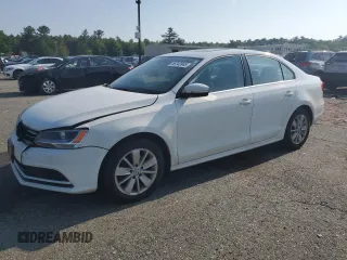 2015 Volkswagen Jetta Sport z VIN 3VWD17AJ8FM346394, wystawiony jako Copart lot #59743945 z przebiegiem 144 958 mil mil oraz Szkoda całkowita • Salvage title. Historia ofert i sprzedaży dostępna na DreamBid. Obrazek 1.