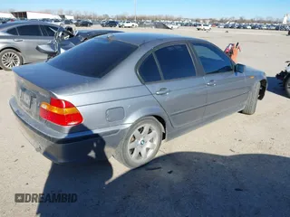 2004 BMW 3 Series 325i with VIN WBAET37414NJ84667, listed as a IAAI auction lot 41723669 with 160,384 mi miles. Bid and sale history available at carsss.com. Image 4.