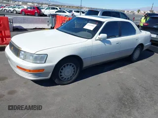 1991 Lexus LS z VIN JT8UF11E5M0073935, wystawiony jako IAAI lot #41633383 z przebiegiem 139 408 mil mil oraz . Historia ofert i sprzedaży dostępna na DreamBid. Obrazek 2.
