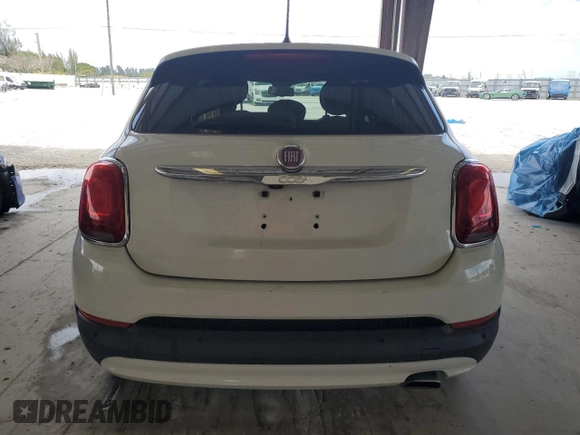 2016 FIAT 500X Lounge z VIN ZFBCFXDT2GP397059, wystawiony jako Copart lot #54349335 z przebiegiem 105 642 mil mil oraz Szkoda całkowita • Salvage title. Historia ofert i sprzedaży dostępna na DreamBid. Obrazek 6.
