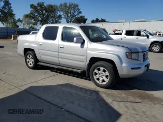 2007 Honda Ridgeline RTL w/Leather with VIN 2HJYK16567H539309, listed as a Copart auction lot 73769974 with 173,499 mi miles and Salvage Title. Bid and sale history available at carsss.com. Image 4.