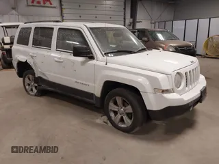 2014 Jeep Patriot Latitude with VIN 1C4NJRFB7ED897866, listed as a IAAI auction lot 41364780 with 118,190 mi miles and . Bid and sale history available at DreamBid. Image 1.