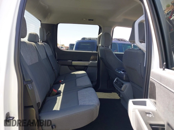 2023 Ford F-150 Lightning Pro with VIN 1FTVW1EL4PWG42578, listed as a IAAI auction lot 41992446 with 26,729 mi miles and . Bid and sale history available at DreamBid. Image 8.