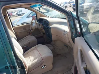 1993 Ford Aerostar Eddie Bauer with VIN 1FMDA41X6PZA63185, listed as a IAAI auction lot 41708318 with Not Provided miles. Bid and sale history available at carsss.com. Image 5.