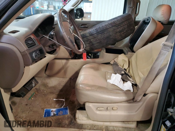 2014 Chevrolet Suburban LT with VIN 1GNSCJE01ER203892, listed as a Copart auction lot 45012795 with 183,901 mi miles and Salvage Title. Bid and sale history available at carsss.com. Image 7.