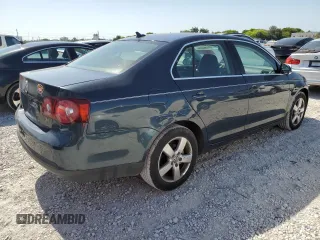 2009 Volkswagen Jetta SE с VIN 3VWRM71K09M091296, выставлен на аукционе Copart как лот 57342255 с пробегом 100 184 миль миль и Списание • Salvage title. История ставок и продаж доступна на DreamBid. Изображение 3.