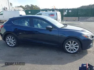 2014 Mazda 3 S Touring with VIN JM1BM1L32E1199515, listed as a IAAI auction lot 41783271 with 152,443 mi miles and . Bid and sale history available at DreamBid. Image 13.