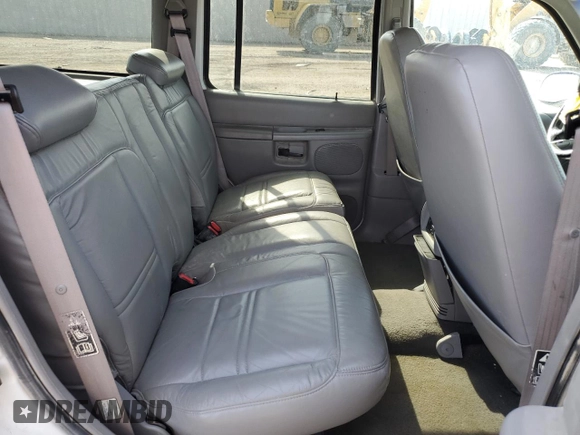 2000 Ford Explorer XLT with VIN 1FMZU83PXYZA71034, listed as a Copart auction lot 55447585 with 175,118 mi miles and Salvage title. Bid and sale history available at DreamBid. Image 11.