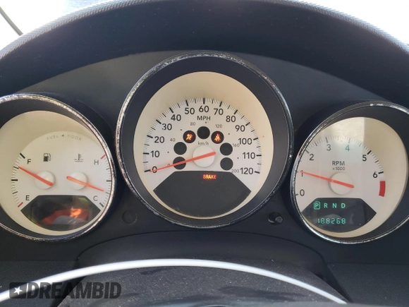 2009 Dodge Caliber SXT with VIN 1B3HB48A99D157051, listed as a Copart auction lot 52098965 with 188,268 mi miles and Salvage Title. Bid and sale history available at carsss.com. Image 9.