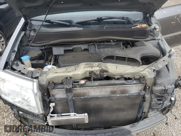 2011 Honda Pilot Touring z VIN 5FNYF4H94BB046303, wystawiony jako Copart lot #58017515 z przebiegiem 118 384 mil mil oraz Szkoda całkowita • Salvage title. Historia ofert i sprzedaży dostępna na DreamBid. Obrazek 12.