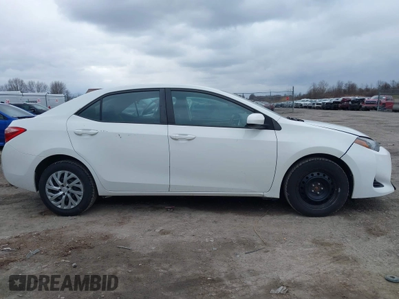 2019 Toyota Corolla L with VIN 5YFBURHE0KP889909, listed as a IAAI auction lot 41888953 with 130,529 mi miles. Bid and sale history available at carsss.com. Image 13.