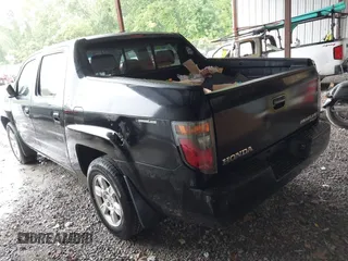 2007 Honda Ridgeline RTL with VIN 2HJYK16547H549241, listed as a IAAI auction lot 42282477 with 214,685 mi miles and . Bid and sale history available at DreamBid. Image 3.