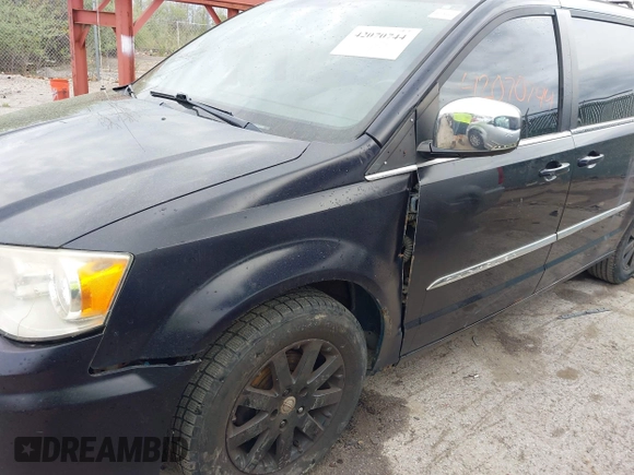 2011 Chrysler Town & Country Touring L with VIN 2A4RR8DG8BR645498, listed as a IAAI auction lot 42070744 with 173,661 mi miles and . Bid and sale history available at carsss.com. Image 6.